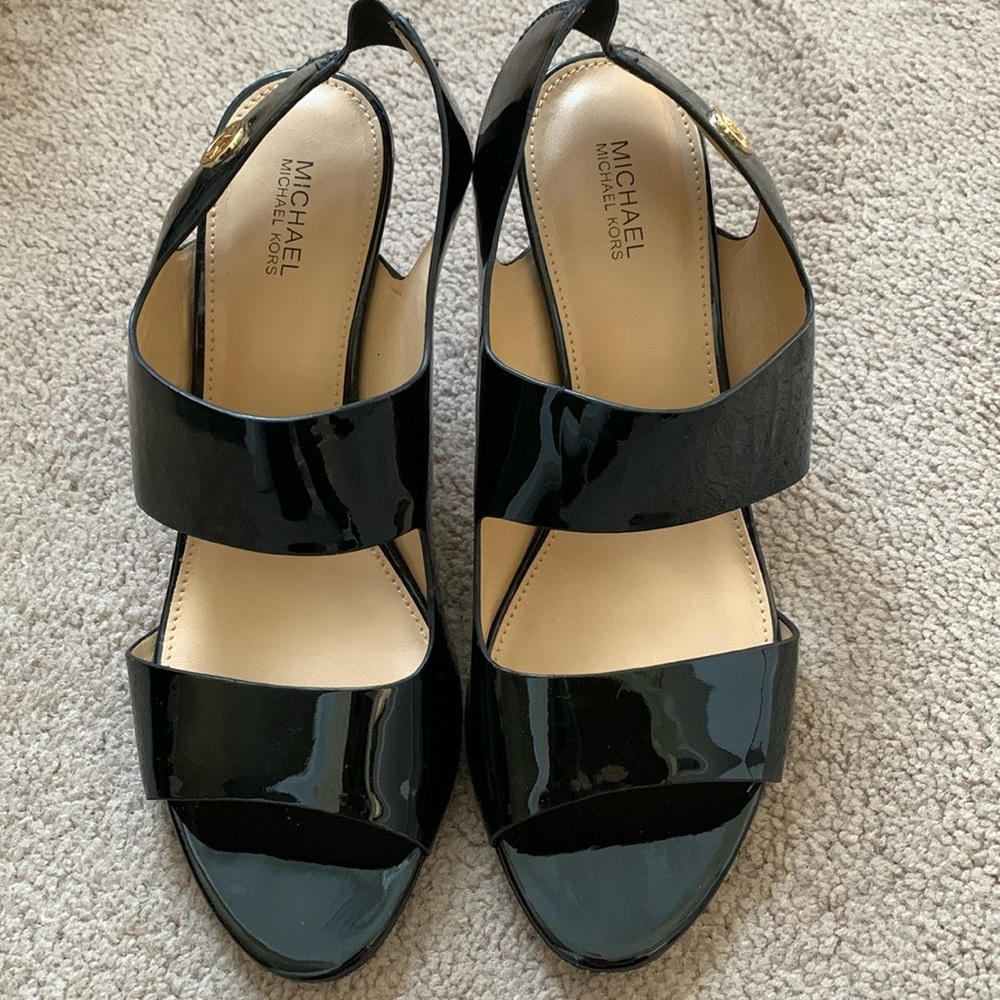Michael Kors patent leather sandals with heal strap.  Really cute on!